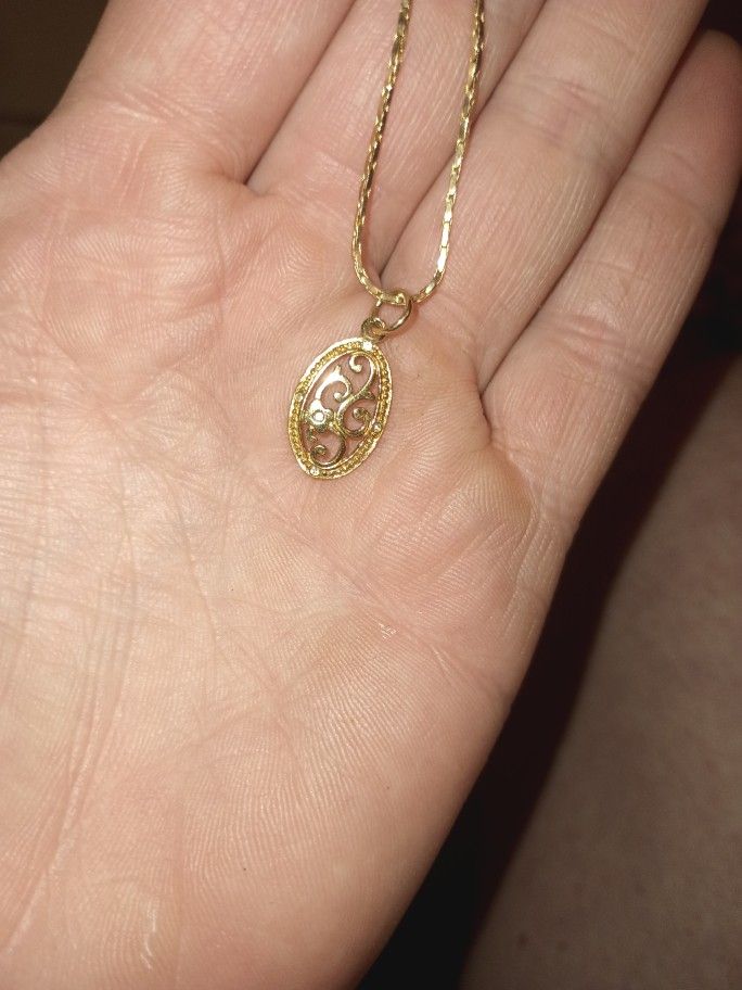 Gold And Silver Pendant