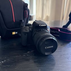 Canon EOS Rebel T5i (700D) 18MP Digital SLR w/ EF-S 18-55mm IS STM & Case