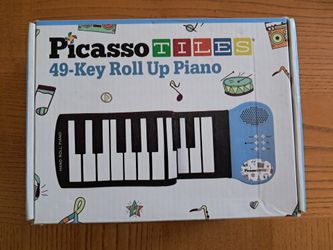 Roll up piano MISB