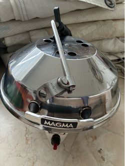 Magma party grill with rod holder mount. Good condition.