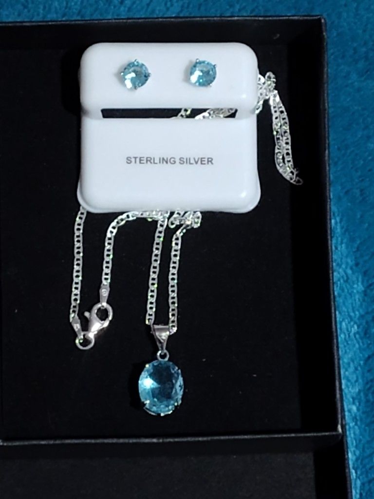 Blue Topaz Sterling Silver Pendant And Matching Sterling Silver Earrings With Chain