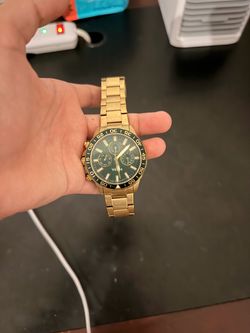 Gold tone fossil watch