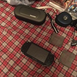 PSP With charger case game case movies in extra