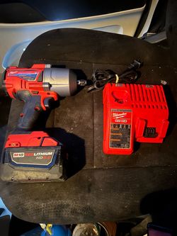 Milwaukee Tools M18 impact with charger and battery