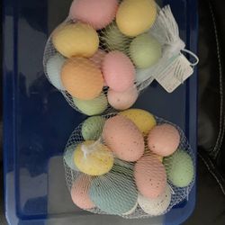 Easter fake Eggs And Pink Grass