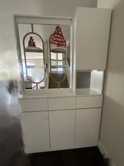 Need gone asap - White cabinet with decorative furnishings