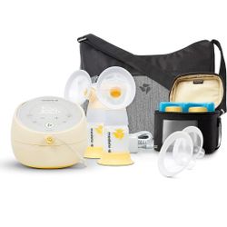 Medela breast pump (barely used, almost new)