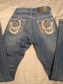 Flared jeans diamond horse shoe design