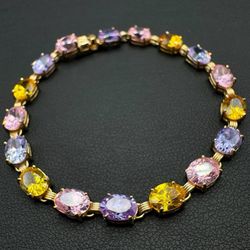 10k solid yellow gold multi color stone 7” lady’s bracelet