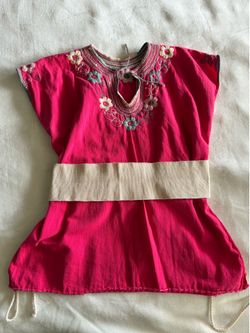 Traditional Mexican shirt with embroidery flowers