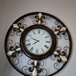 Clock width  38 1/2 inches like new excellent condition  $100.00