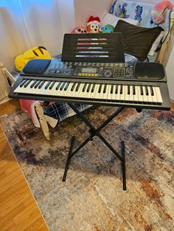 Casio CTK-611 with stand. No wires.