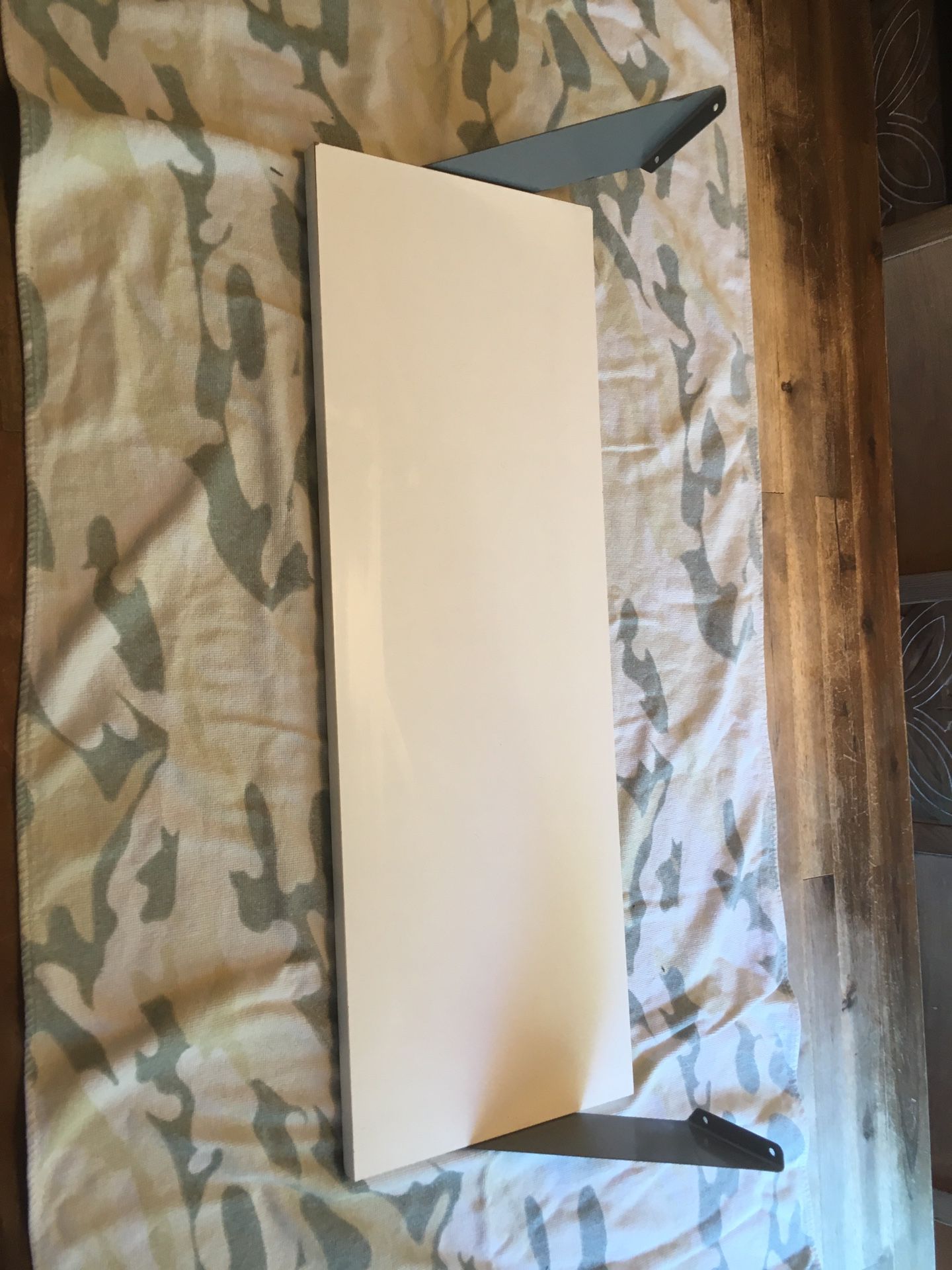 Two wall shelves - White with gray brackets - 27 1/2” x 9 1/2” – Five dollars each