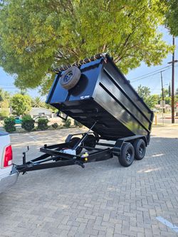 BRAND NEW DESIGN DUMP TRAILER 12x8x4 12,000 LBS ROLLING TARP AND SPARE TIRE HYDRAULIC SYSTEM ELECTRIC BRAKES TITLE IN HAND FOR ANY QUESTION TEXT ME PL