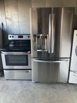 LG Fresh Door Stainless Steel Refrigerator, dimensions W36-D31-H69, everything works; Frigidaire electric stove in good condition, clean and nice, one