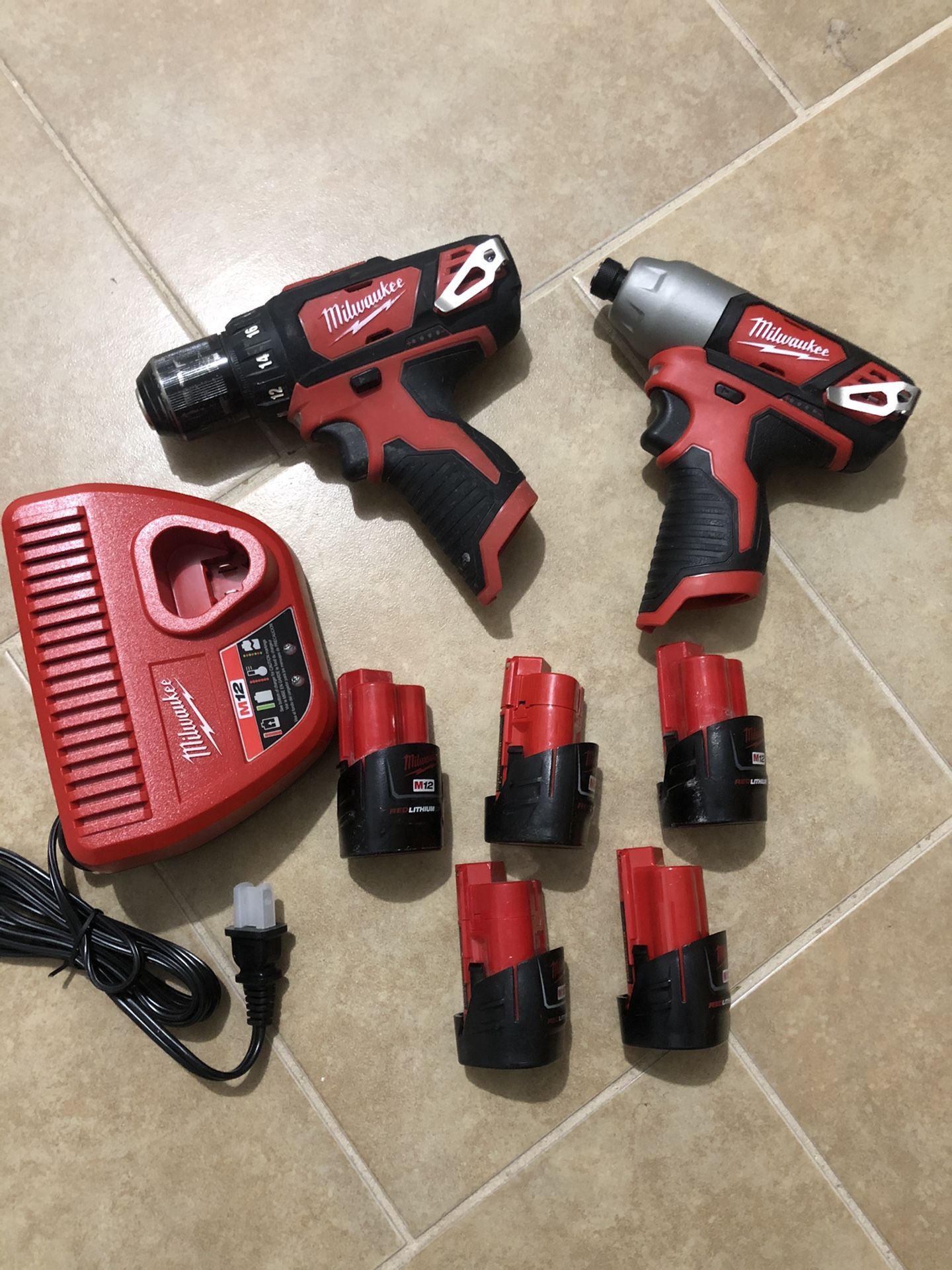 Milwaukee drills set, 5 batteries and charger