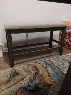 Table set with 4 chairs and a bench