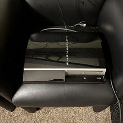 PlayStation 3 With Games And Steering Wheel 