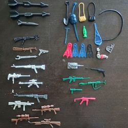 Vintage action figure weapons and gear lot