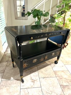 Japanese wings table  with drawer  39” long without wings (12”long each wing) 19” deep 30” height excellent condition