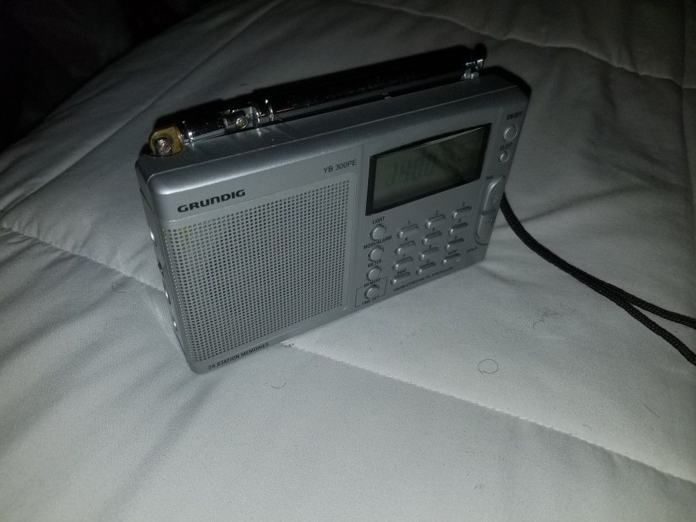 Grinding portable radio