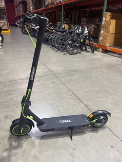 Electric scooter with shock absorption