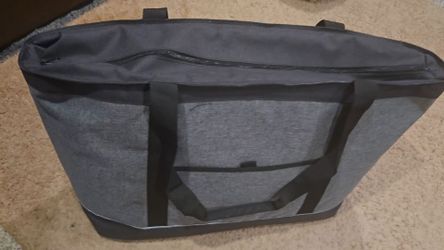 zippered canvas style insulated bags. 50 ilbs rated.