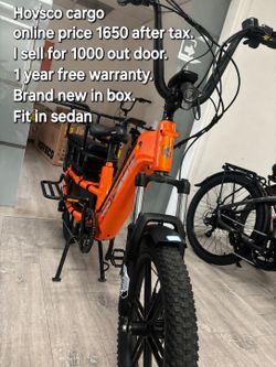 Grey and orange cargo e-bike available - family electric bike