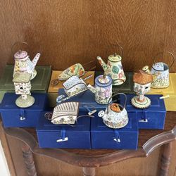 Collection Of Enamel Miniature Teapots And Garden Accessories 