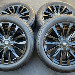22” Cadillac Escalade Gloss black OEM wheels and tires 