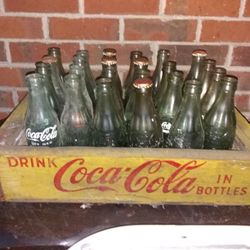 Vintage Coca-Cola bottles with original case