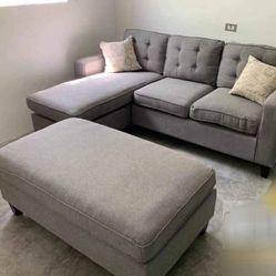Like new light grey linen Sectional Sofa with Ottoman and 2 accent pillows.