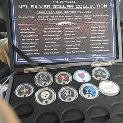 Silver dollar and golden brass coin