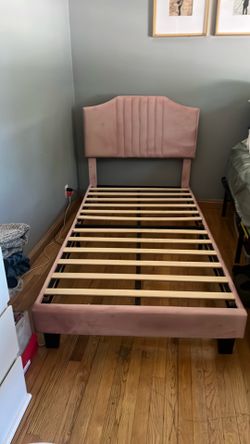 Twin pink velvet headboard and frame