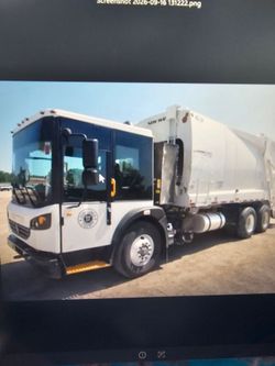 White Rear-Loader Garbage Truck