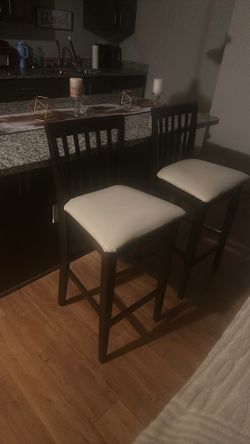 Brown and tan wood/ leather barstool
