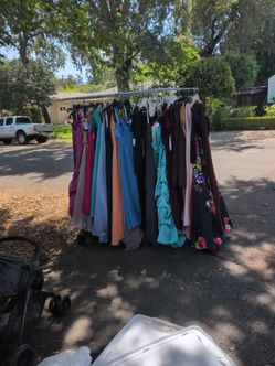 Lot of Formal Gowns on Rack