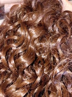 Curly brown ponytail