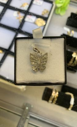 FLAWLESS 10K DIAMOND BUTTERFLY PENDANT 