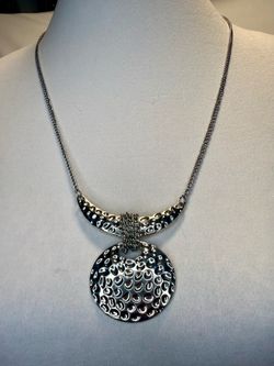Vintage Silver toned necklace with hammered pendant