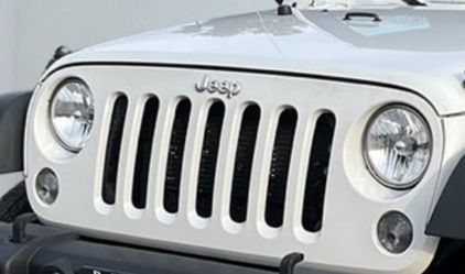 White 2016 Jeep Wrangler Sport Unlimited  front grill like new