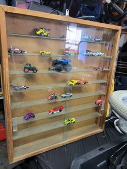 Wood and Glass Display Case with Die-Cast Cars Selling all together