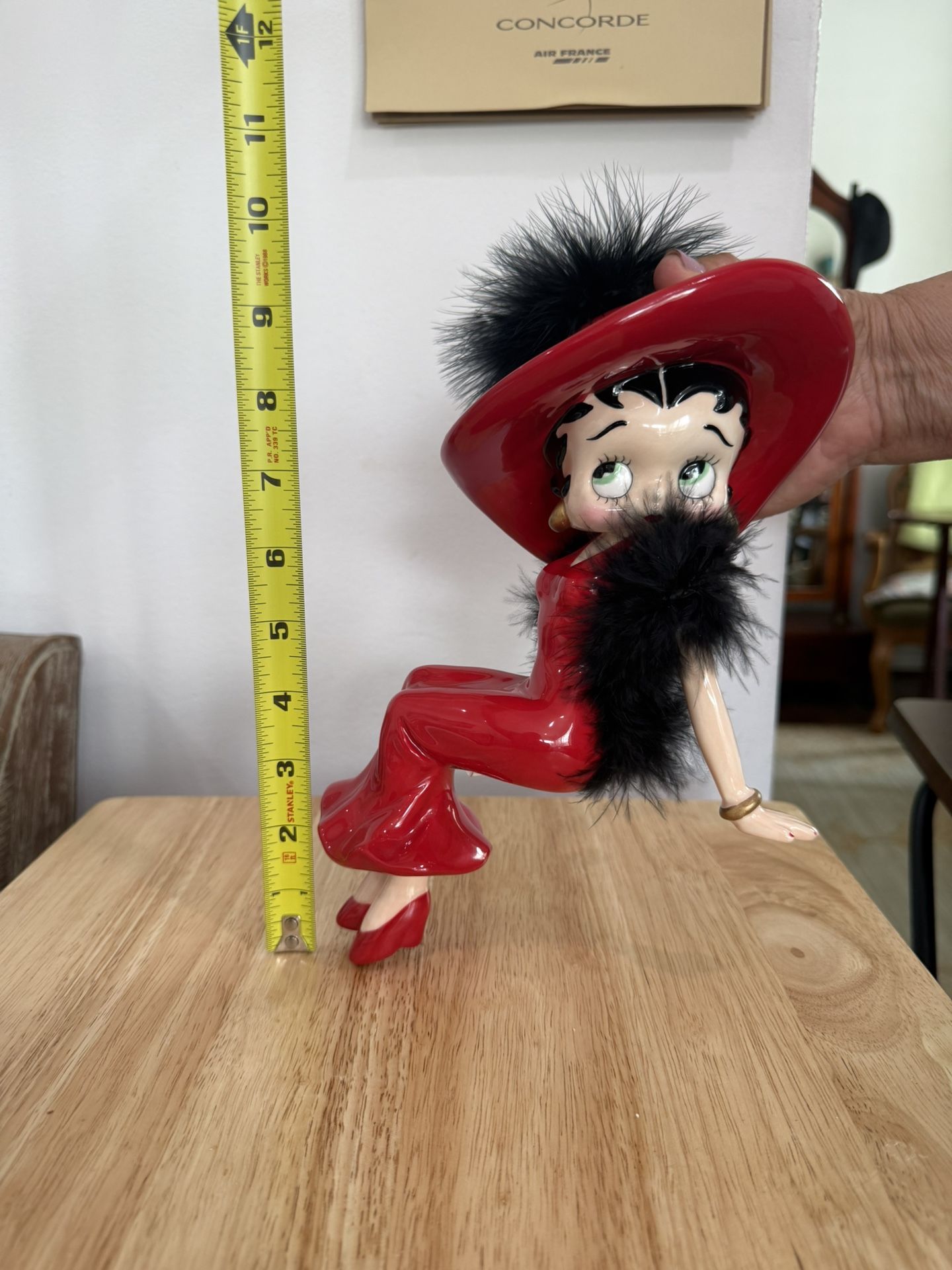 betty boop in red dress a (Face On, Standing On A Red Bar) Comic Art Website This officially licensed collectible captures Betty in one of her most iconic poses playful Betty Boop Red Dress Statue