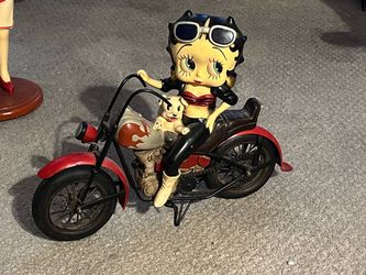 Vintage Betty Boop on a motorcycle