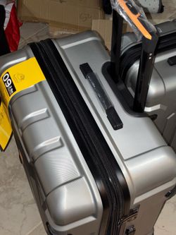 28 inch silver expandable, rolling suitcase brand new with TSA certified combo luck