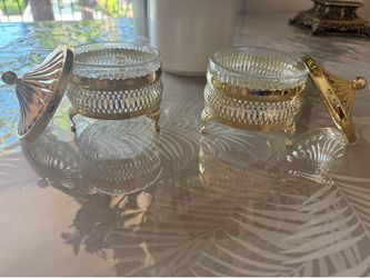 Set of two beautiful nuts shaped pieces, silver colored, includes 3 pieces in total.