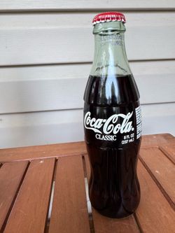 Vintage Coca Cola and Pepsi Bottles