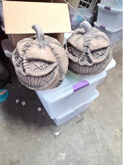 Halloween pumpkins and howling Skelton dogs