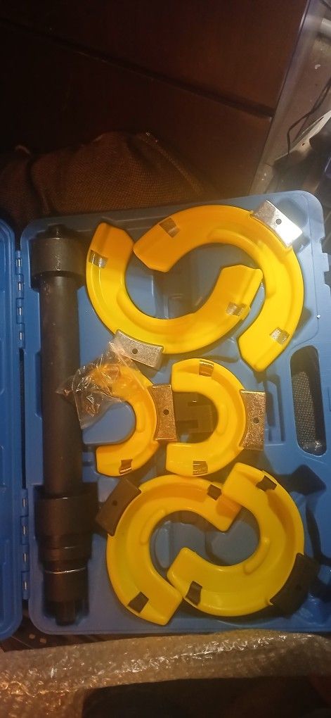 MacPherson strut spring compressor tool kit.