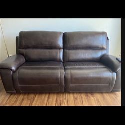 Beautiful Semi New Ashley Leather Brown Sofa and Chair All Electric Reclinable and Adjustable Head Rest